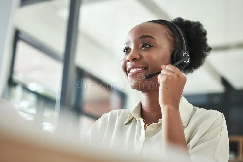 black-woman-call-center-phone-consultation-smile-office-contact-us-work-telemarketing-consulting-job-african-female-279769731